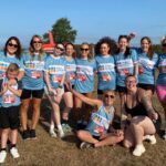 Group photo of the Tarr family and Emergency Department 5k team