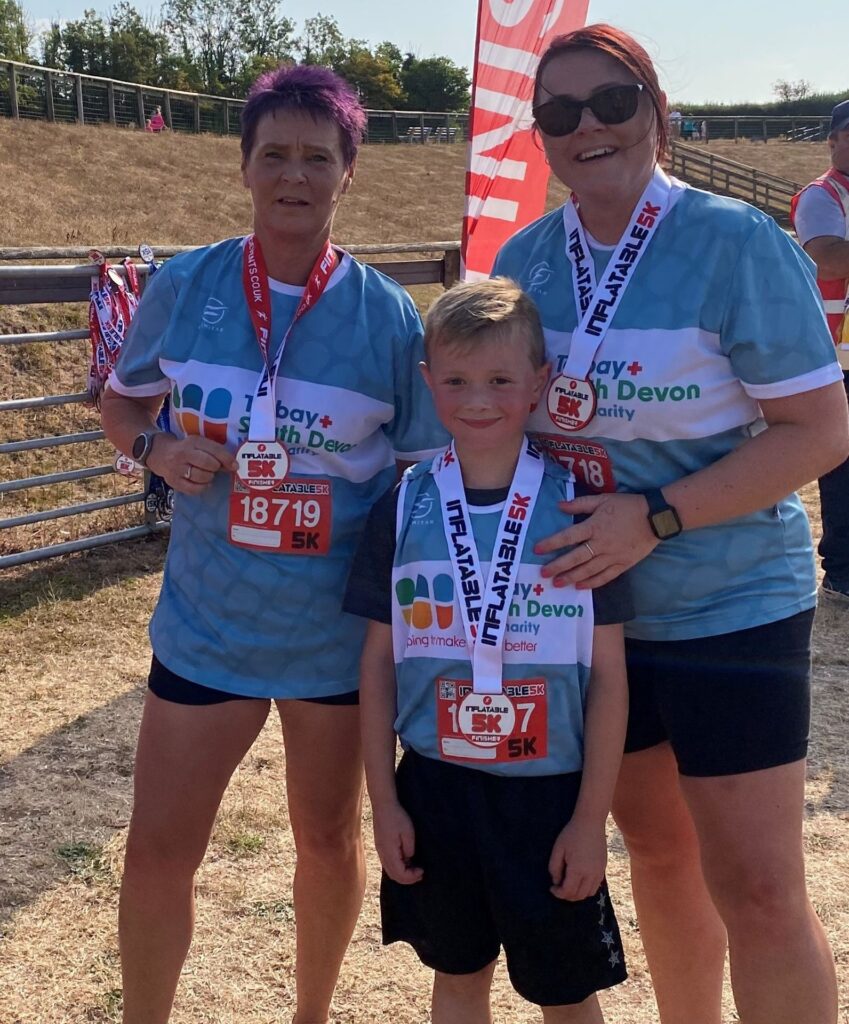 The Tarr family with their medals